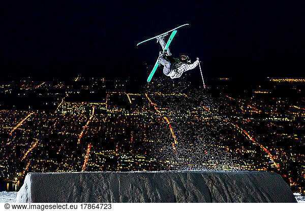 Skier Jumping Over City Lights in Vancouver British Columbia Canada