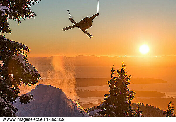 Skier Riding Jump at Sunset