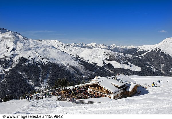 Skiers at Holzalm  Skiing area Hochfügen  Zillertal  Tyrol  Austria  Europe