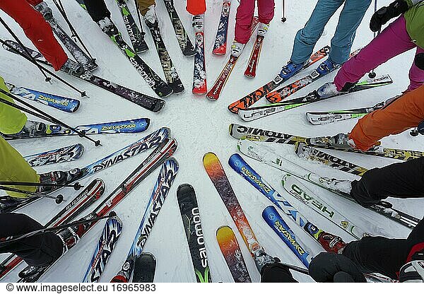 Skiers' ski tips form a circle  Trois 3 Vallees ski resort  Haute Savoie  France  Europe