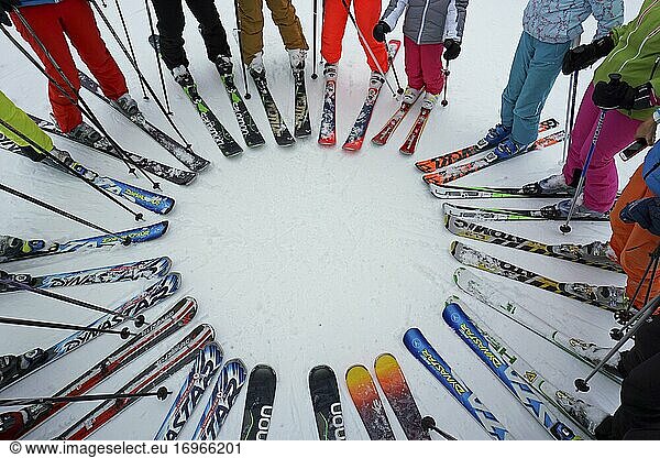 Skiers' ski tips form a circle  Trois 3 Vallees ski resort  Haute Savoie  France  Europe