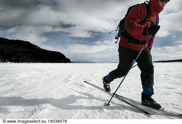 Skiing on the frozen tundra of Moosehead Lake  Maine.