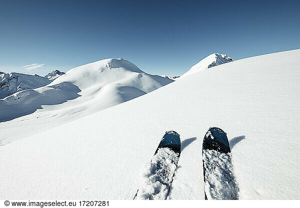 Skis on snow against blue sky  Namloser Wetterspitze  Lechtal Alps  Tyrol  Austria