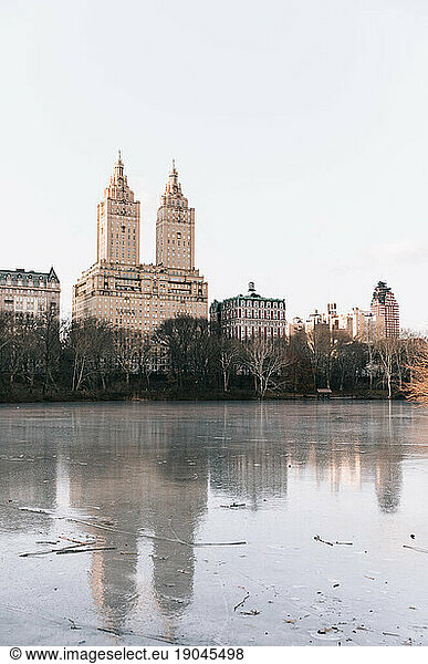 Skyline  trees at river/lake during Autumn in Central Park  N