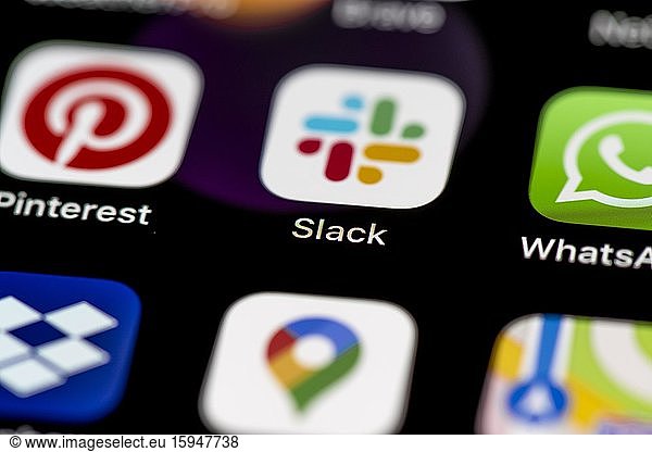 Slack App  App Icons on a mobile phone display  iPhone  Smartphone  close-up