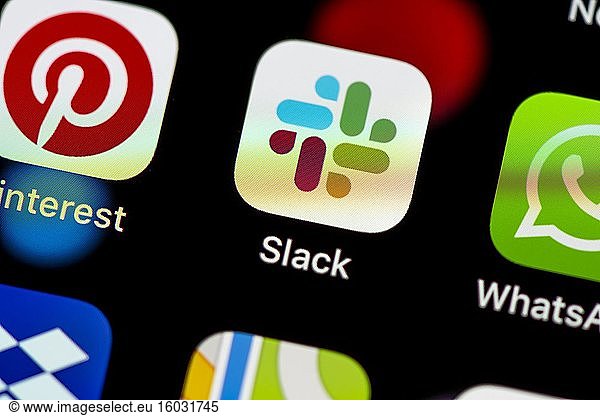 Slack Icon  productivity app  app icons on a mobile phone display  iPhone  smartphone  close-up