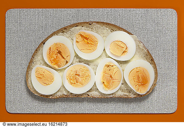 Slice of bread with eggs  elevated view