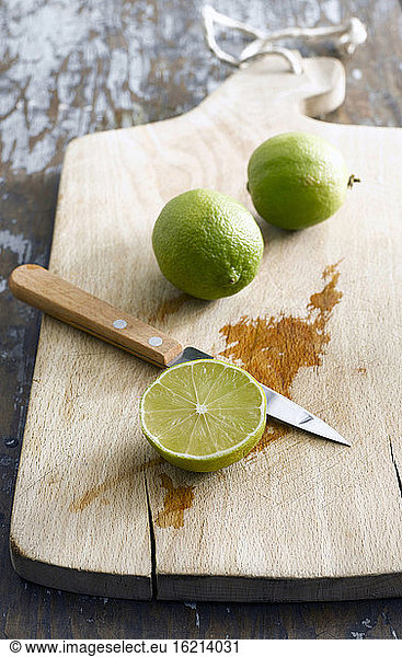 Sliced lime on chopping board  elevated view