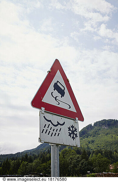 Slippery When Wet and Icy Conditions Sign  Austria