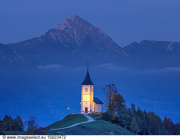 Slovenia  Church of St Primoz near Jamnik at dusk
