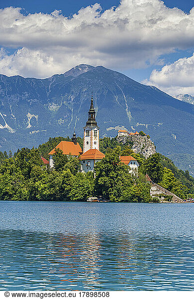 Slovenia  Upper Carniola  Church  Scenic view of church on Bled Island with Julian Alps in background