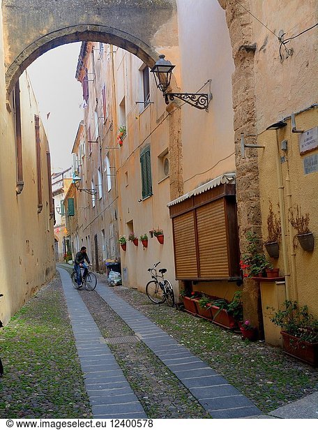 Small street in Alghero  Sardinia  Italy.