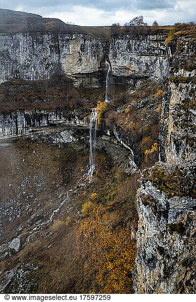 Small waterfall in North Caucasus during autumn