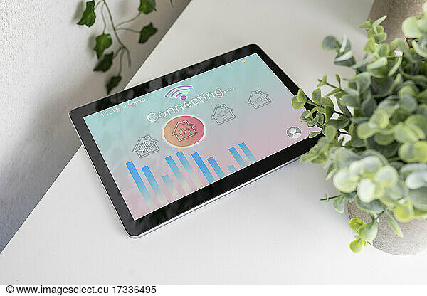 Smart home icons on digital tablet