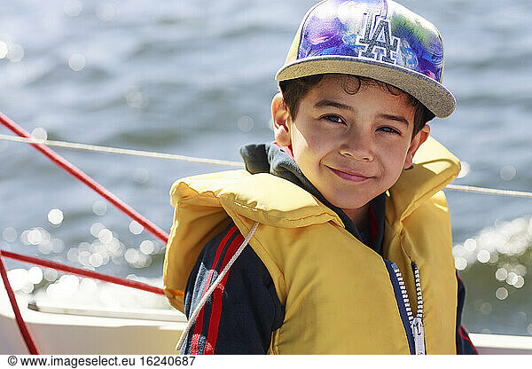 Smiling boy on boat