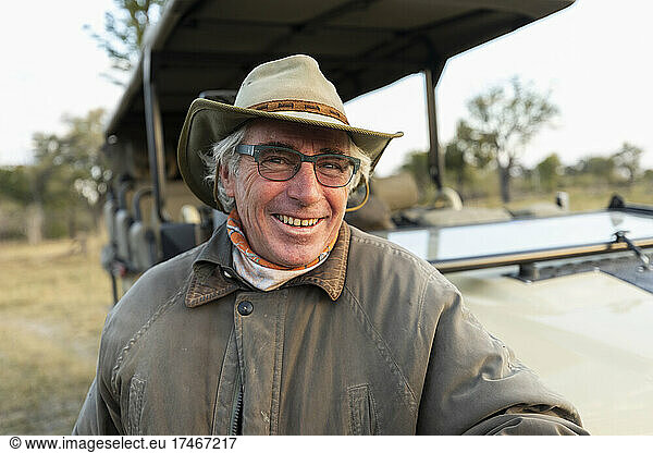 smiling safari guide  Okavango Delta  Botswana