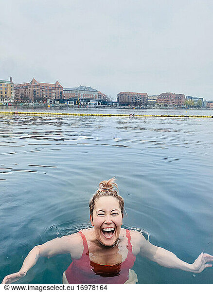 Smiling Woman Full of Joy Cold Water Swimming In Denmark