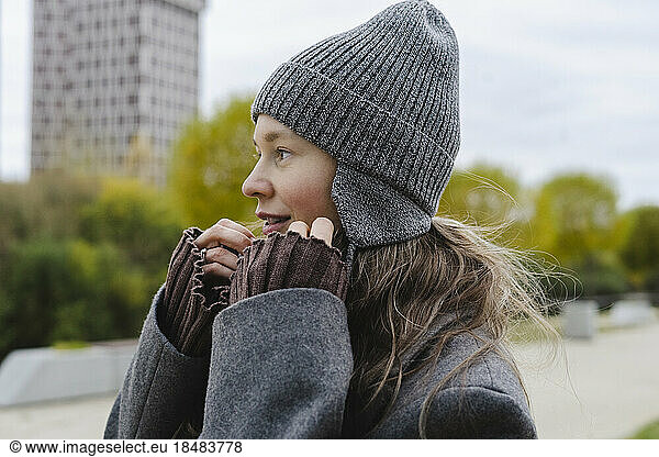 Smiling woman wearing knit hat