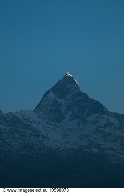 Snow capped mountain in darkness  Nepal