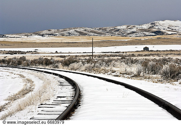 Snow Covered Railroad Tracks