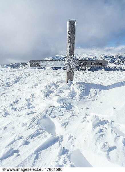 Snow-covered summit cross  summit of the Lawinenstein  Tauplitzalm  Styria  Austria  Europe