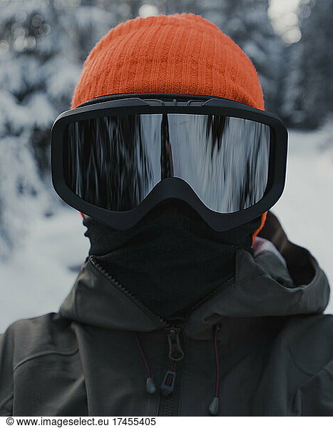 Snowboarder portrait with orange cap