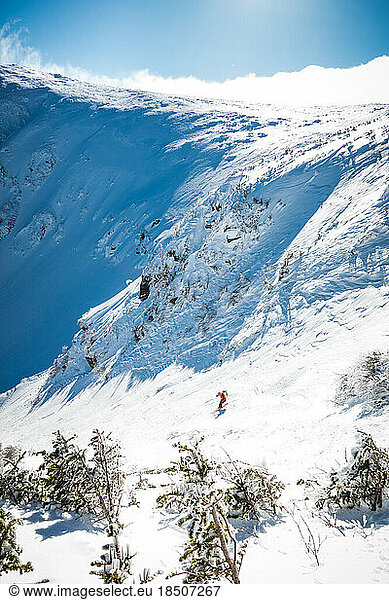 Snowy Tuckerman Ravine with skier descending Right Gully