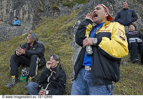 Soccer Fans at the opening of a new soccer field in Qaqortoq  Greenland.