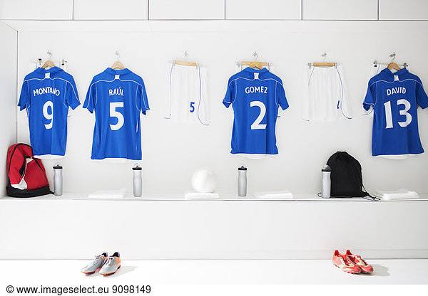 Soccer team uniforms in locker room