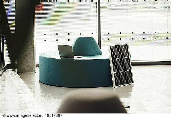 Solar panel with laptop in office