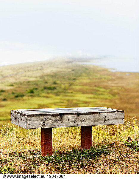 Solitary bench overlooking the Humboldt Bay National Wildlife Refuge  the South Spit of Humboldt Bay in Eureka  California.