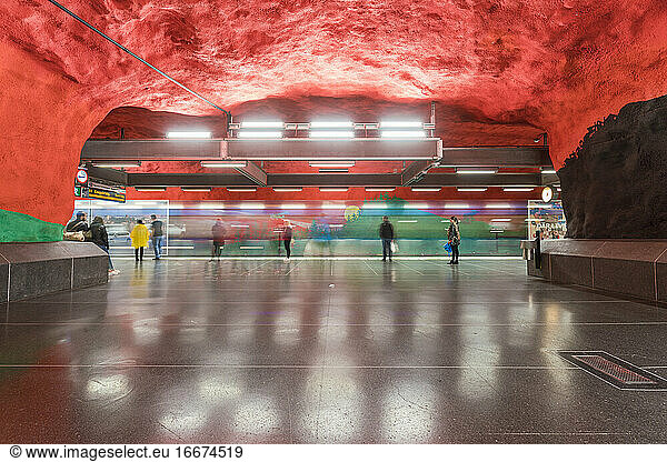 Solna Centrum subway station in Stockholm with people