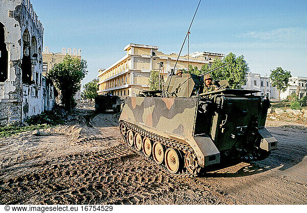 Somalia,  Operation Restore HopeSomalia,  Mogadishiu,  “Operation Restore Hope ,  after the fall of dictator Barre in 1991,  civil war breaks out in Somalia. After a decision by the United Nations Security Council,  a military action (UNITAF) under the leadership of the USA (with the participation of 35 states,  including the Federal Republic of Germany) with the aim of ending the civil war and the famine,  restoring public order establish and install a central government. Arrival of German blue helmet soldiers in Mogadishu as part of the UN mission “UNISOM . Convoy of German units with heavy equipment in the German headquarters in Belet Huen (Beledweyne). For security reasons,  the convoy is accompanied by the international troops. Mogadishu,  March 1993.
