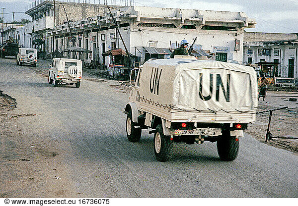 Somalia  Operation Restore HopeSomalia  Mogadishiu  “Operation Restore Hope   after the fall of dictator Barre in 1991  civil war breaks out in Somalia. After a decision by the United Nations Security Council  a military action (UNITAF) under the leadership of the USA (with the participation of 35 states  including the Federal Republic of Germany) with the aim of ending the civil war and the famine  restoring public order establish and install a central government. Arrival of German blue helmet soldiers in Mogadishu as part of the UN mission “UNISOM . Convoy of German units with heavy equipment in the German headquarters in Belet Huen (Beledweyne). For security reasons  the convoy is accompanied by the international troops. Mogadishu  March 1993.