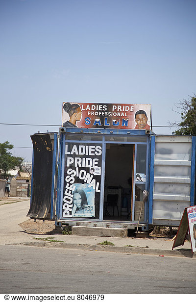 South Africa  Garden Route  Port Elizabeth  Ladies hairdresser kiosk with ads  New Brighton