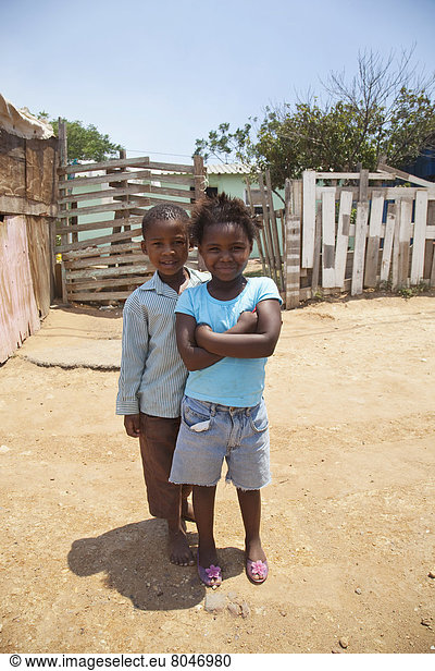 South Africa  Garden Route  Port Elizabeth  Portrait of boy and girl at street  New Brighton