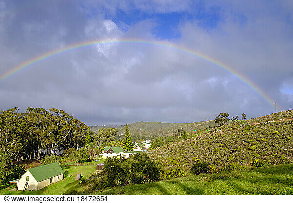 South Africa  Western Cape  Malgas  Rainbow arching over small secluded village