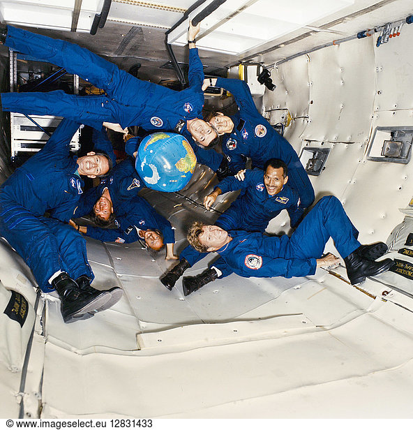 SPACE: TRAINING  1991. The crew of the STS-45 mission in zero gravity training. Clockwise from top: Dirk Frimout  Michael Foale  Brian Duffy  Charles Chappell  Kathryn Sullivan  Charles Bolden and Byron Lichtenberg. Photograph  1991.