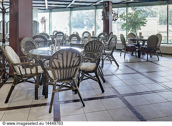 Spacious Cafe With Rattan Furniture