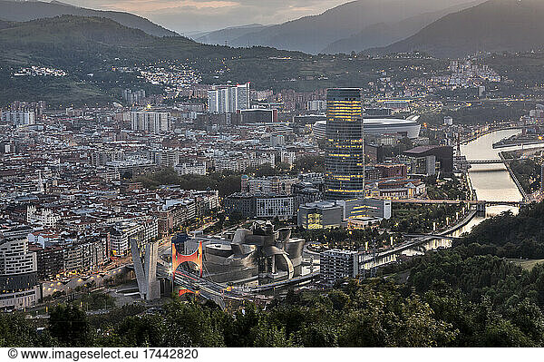 Spain  Biscay  Bilbao  Riverside city at dusk