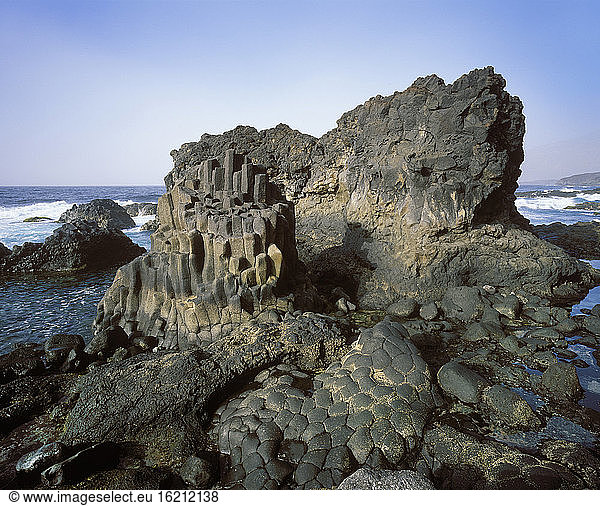 Spain  Canary Islands  El Hierro  Charco Azul  basalt rock at sea side