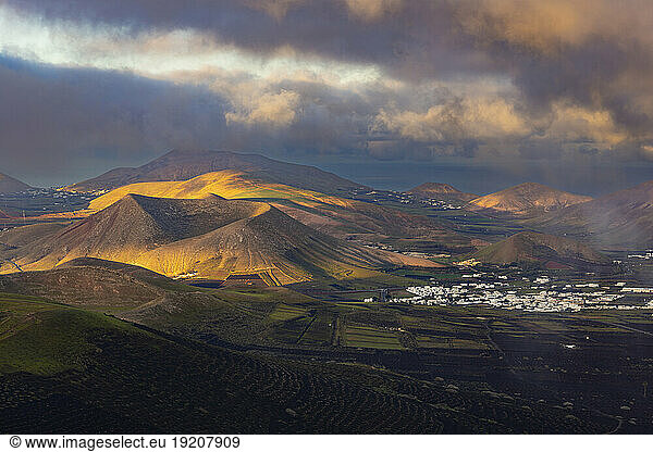 Spain  Canary Islands  La Geria  View from Montana de Guardilama volcano at cloudy dawn
