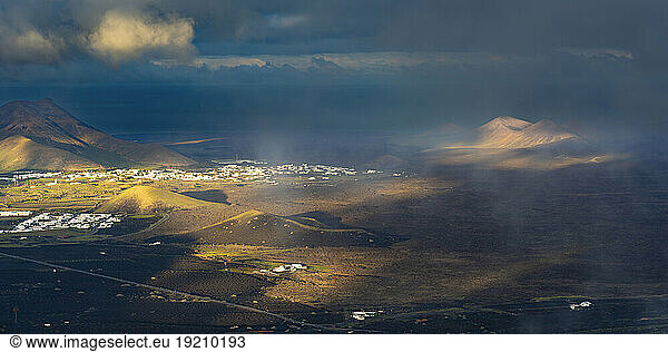 Spain  Canary Islands  La Geria  View from Montana de Guardilama volcano at cloudy dawn