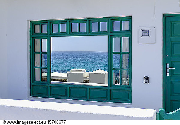 Spain  Canary Islands  Punta Mujeres  Atlantic Ocean reflecting in shiny window