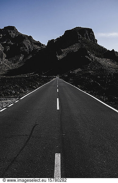 Spain  Canary Islands  Tenerife  Diminishing perspective of empty highway in Teide National Park