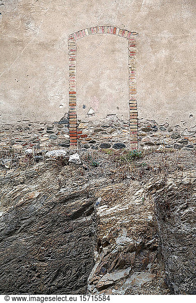 Spain  Catalonia  Bricked up doorway of abandoned building