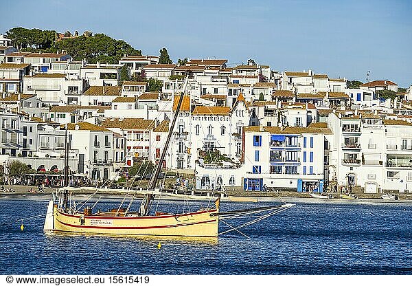 Spain  Catalonia  Cadaques  picturesque fishing village with typical Catalan architecture  traditional boat