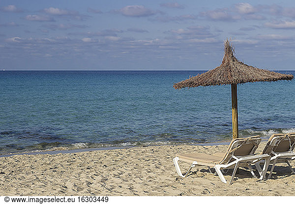 Spain Formentera Es Arenals sunshade and beach chairs