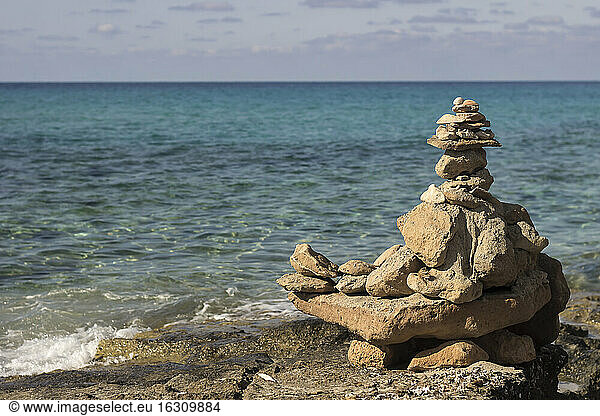 Spain  Formentera  pyramide made of stones at Playa de Migjorn