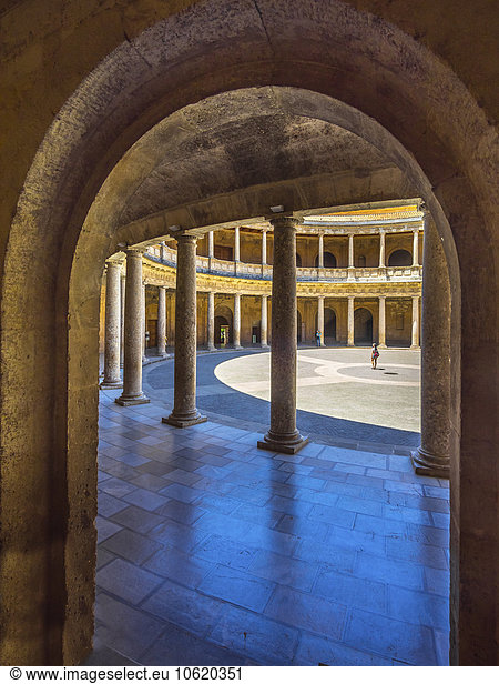 Spain  Granada  view to courtyard of Palacio de Carlos V through an arch